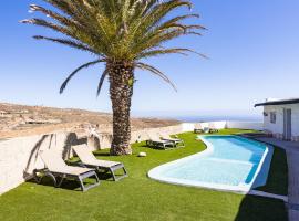 Oasis Tenerife Rentals con Piscina climatizada, Cocina exterior y Barbacoa, hotel u gradu El Draguito
