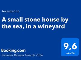 A small stone house by the sea, in a wineyard, Hotel in Nerežišća