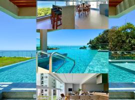Apartamento em Condomínio Frente-Mar com Piscinas, Jacuzzi Aquecida, Sauna, Academia, Brinquedoteca, Churrasqueira na Sacada, Cozinha Completa e Lazer de Home Club, khách sạn ở Piçarras