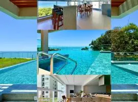 Apartamento em Condomínio Frente-Mar com Piscinas, Jacuzzi Aquecida, Sauna, Academia, Brinquedoteca, Churrasqueira na Sacada, Cozinha Completa e Lazer de Home Club
