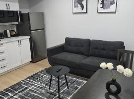 Cozy 1-Bedroom Suite Winnipeg, viešbutis mieste Vinipegas
