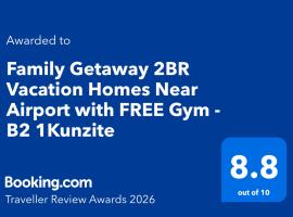 Family Getaway 2BR Vacation Homes Near Airport with FREE Gym - B2 1Kunzite, Hotel in Puerto Princesa