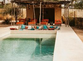 Magnifique maison de d&eacute;corateur entre mer et foret, cottage ở Ndangane