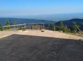 Mountain Retreat with Majestic Waterfall & Sunrise Views