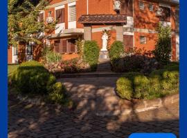 Casa Santa Cruz, hotel i Passo Fundo