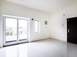 Hotel O Black Pearl Residency, khách sạn ở Pīlamedu