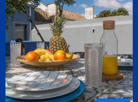 OrangeTreeHouses: Montijo'da bir otel