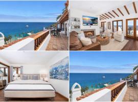 10-Star Property! Premium Ocean Views, Immaculate Corner Condo with Fireplace, New Golf Cart, hotel en Avalon