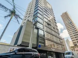 Aptos em prédio a 90 m da praia de Perequê - RIHs