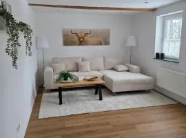 Unter den Balken - Helle Landhauswohnung mit Ofen & Ruhe