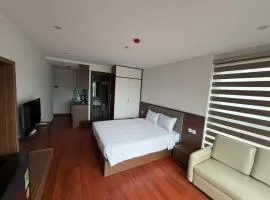Luxe Paradise Suites Đội Cấn