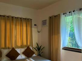 Paians 2BR Home, across Cloud 9, General Luna, hotel sa Catangnan