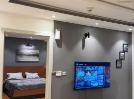 The Graphite 1BHK Self Check In 60 inch TV Wifi
