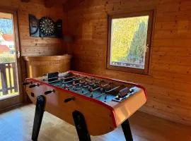 Chalet familial au centre ville de Gerardmer avec jeux et piscine extérieure estivale