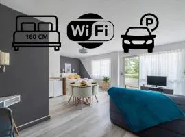 Grand studio confort, Parking