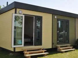 Surf Shack 1 - Zimmer nah am Meer, WLAN, Gemeinschaftsgarten, Surfschule, Naturstrand, Parkplatz, Radfahrweg, Promenade in 10 Minuten erreichbar, Stopover Puttgarden