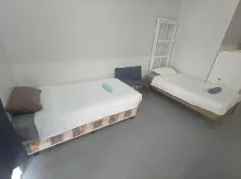 2 Double Beds, 3 Single Beds, and 2 Sofa Beds Serviced Studio