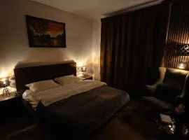 Panoramic top floor retreat with sky city views