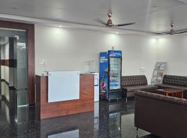 New KR Inn, hotel em Mālūr