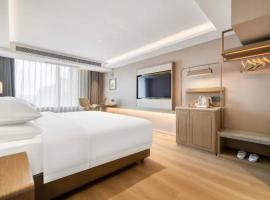深圳宝安国际会展中心里奇酒店, hotel v destinácii Shenzhen