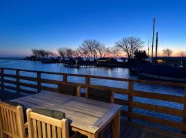 Piratenschiff - First-Class Auszeit mit privaten Spa, Kamin, Meerblick & Gym，費馬恩的飯店