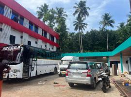 H I lodge and Dormitory, отель в городе Kelakam