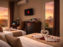 Queen Egypt Pyramids Inn, 4-звезден хотел в Кайро
