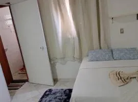 Quarto privado simples em acomodação compartilhada