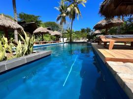 Bungalows les cocotiers, viešbutis vietovėje Nosy-Be