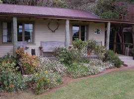 Wheatly Downs Farmstay and Backpackers, cabaña o casa de campo en Hawera