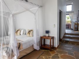 Cheetah View Lodge at Cheetah Conservation Fund, готель у місті Отьїваронґо
