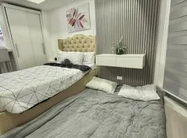 Rienzis Hiraya at Azure North - 11th floor studio with PS4,Washer,Mountain&Beach View