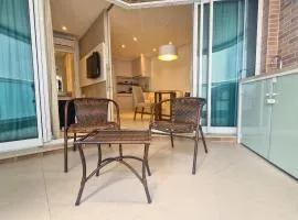 Book Santos Unique 1307 Vista lateral para o mar