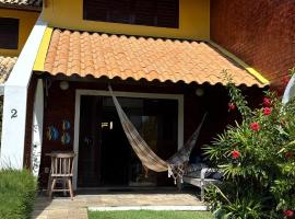 Chalé pé na areia, hotel i Extremóz