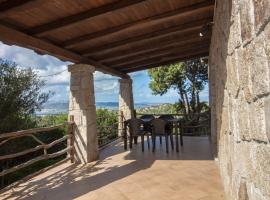 GuestHost - Lovely Villa with Sea View Terrace, Hotel in Cala Bitta