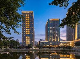 Qinin hotel 沁住酒店重庆江北国际机场华辰财富广场店, hotel i Chongqing