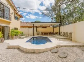 Elegant Surfside Retreat with Private Pool Spacious Outdoor Patio & Walkable Beach Access