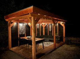 Prachtige stacaravan met heerlijke overkapping, hotel in Eext