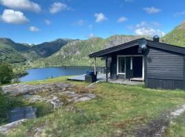Mountain Cabin With Magical View And Tranquil Lake, Hotel in Matre