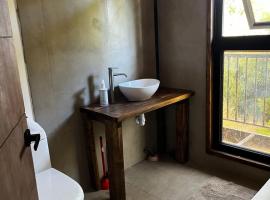 Hostal Rio Cato Borde Rio, hotel di Colonia Bernardo OʼHiggins