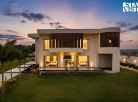 StayVista's The Sweet Life - Luxury Farm stay with Private Pool & Fireplace