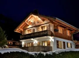Chalet Cristalliers - 5 Bedroom luxury chalet in central Chamonix with log fire and hot tub