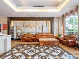 Vienna 3 Best Hotel Dongguan Liaobu Shida Road: Liao-pu şehrinde bir otel