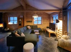 Rundtømmerhus I Skoven Ved Mariager, hotel i Hadsund