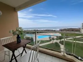 Studio vue mer-piscine et parking