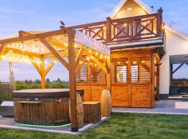 Domek NIVA z Jacuzzi i Widokiem na Zalew, готель у місті Nawóz