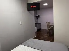 Flat completo em região central e tranquila