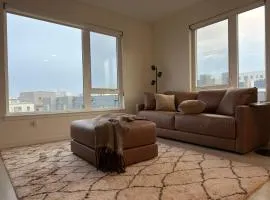 Modern Lux Midrise Stadium & Downtown Views