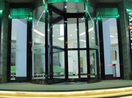 Vatica Tianjin Jinghai Bus Station Home World Plaza Hotel, khách sạn ở Jinghai