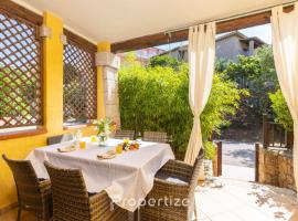 Villetta con idromassaggio e patio by Propertize, Hotel in Golfo Aranci